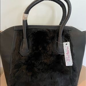 NWT Kira Plastinina black fur front leather handbag.